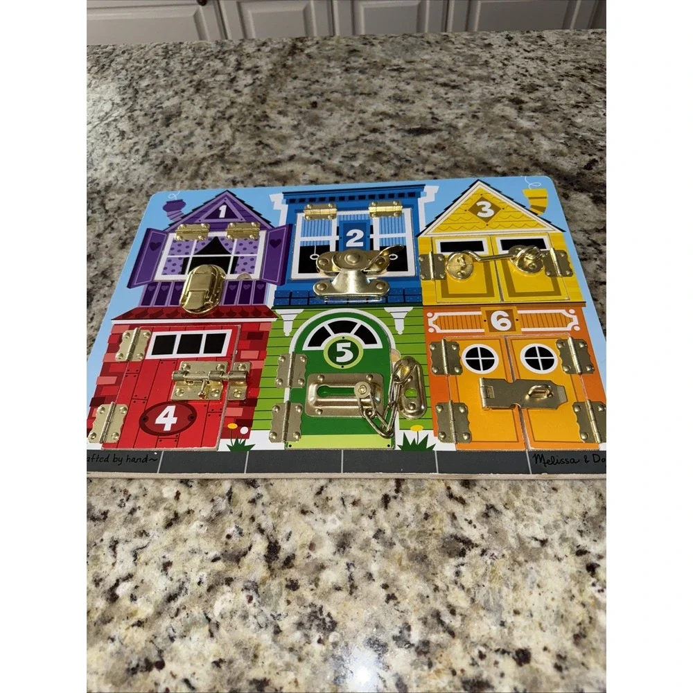 Melissa and Doug Latches Board‎ very cool learning toy by Melissa and Doug